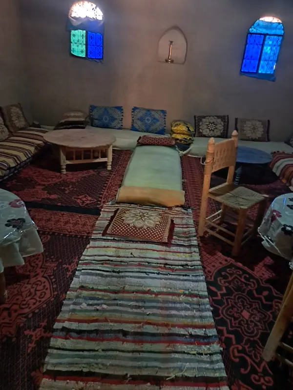 Moroccan lounge with rugs and benches