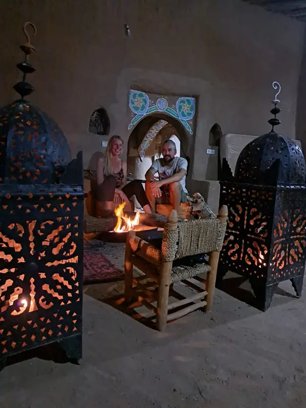Moroccan lounge lit by lanterns